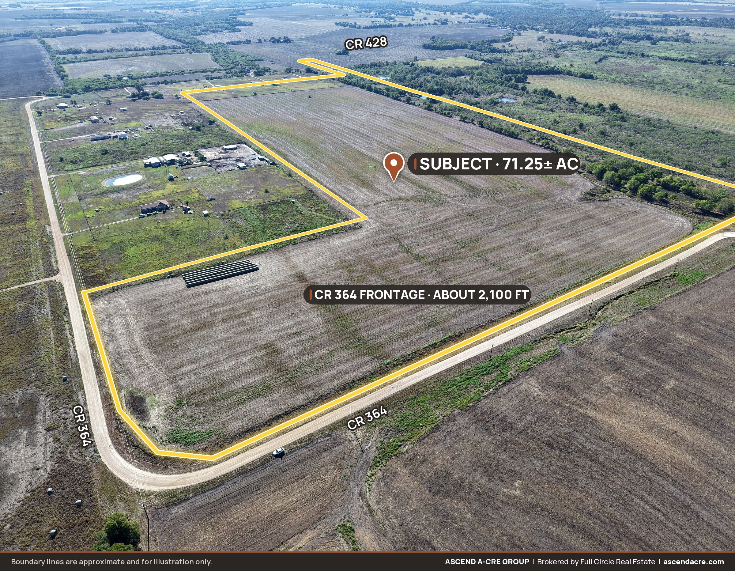 Drone aerial of the northwest corner where CR 364 wraps the tract on two sides